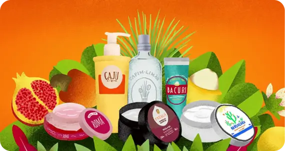 Ilustração colorida com diversos produtos cosméticos naturais em embalagens variadas, rodeados por frutas como romã, caju, manga e folhas verdes, sobre fundo laranja vibrante.